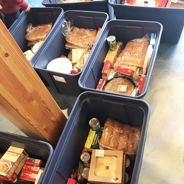 Boxes of Thanksgiving food items and extras from Harbor Church.